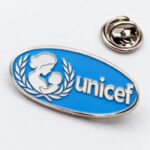 Значки с логотипом Unicef на заказ металлические